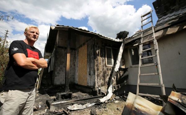 2020-07-23T175051Z_623335908_RC25ZH9J2GOP_RTRMADP_3_UKRAINE-ACTIVIST-ARSON_CREDIT_REUTERS